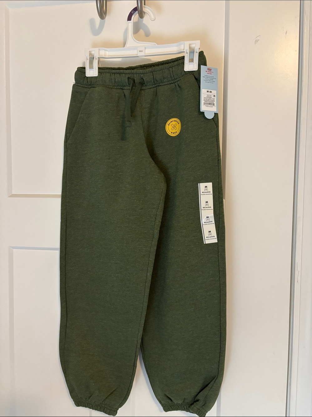Cat & Jack Olive Green Kids Jogger Sweatpants . Relaxed fit. Reinforced knee.